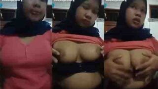bokep tante jilbab pink remas remas payudara